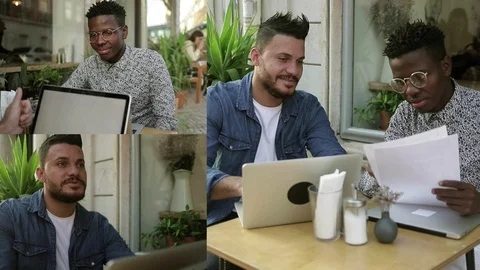 Collage of men in cafe discussing project, working on laptops Stock Footage 107997446