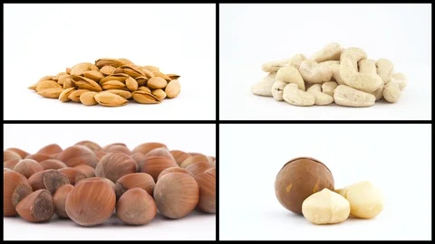 Collage of peeled and shelled nuts collection rotating over white background. Stock Footage 129773335