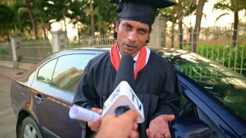 Collage student giving interview on street Stock Footage 278022765