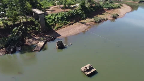 Collapsed Bridge and Ferry After 2024 Floods in Faria Lemos, Brazil Stock Footage 320062764