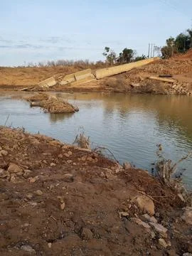 Collapsed Bridge Over Water Foto stock