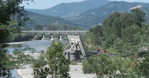 Collapsed bridge on the river bed in Albiano Magra. Stock Footage 153902765
