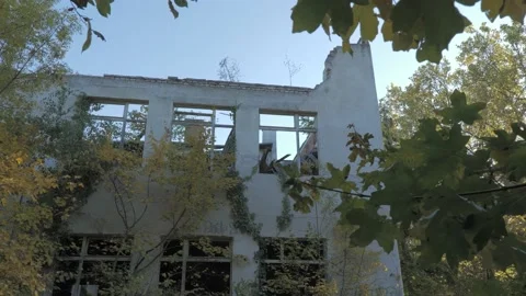 A collapsed building with broken windows Stock Footage 163767763