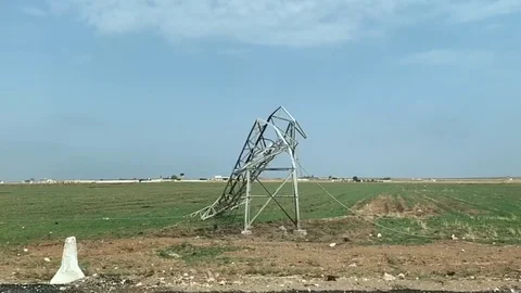 A Collapsed Electric Tower in an Arab Country co Stock Footage 120937341