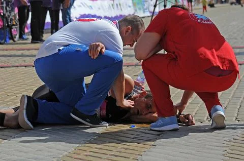 Collapsed marathon runner Stock Photos