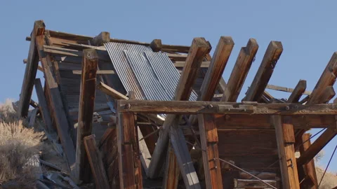 Collapsed Mine Head Frame at Nevada Ghost Town - Shallow DOF Stock Footage 144736368