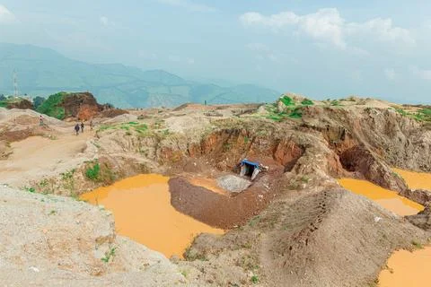 Collapsed Pit and Contaminated Runoff at Rubaya Landslide Site, Eastern DRC Stock Photos