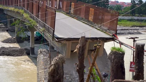 Collapsed road and debris after earthquake Stock Footage 321041261