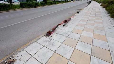 Collapsed Road Bollards with Tape Indicating a Recent Car Crash Stock Footage 306311812