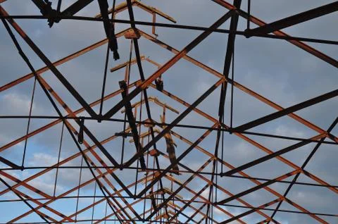 Collapsed roof and iron structure Stock Photos