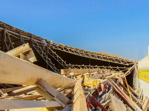 Collapsed structures of a metal frame agricultural building Stock Photos