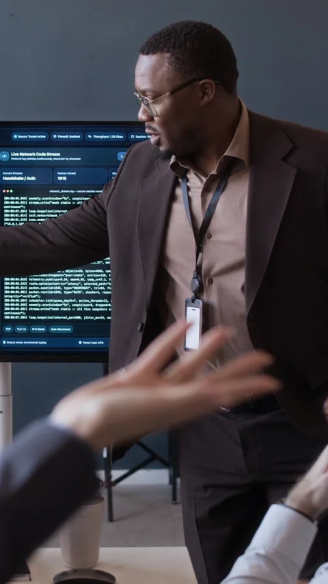Colleagues Analyzing Codes and Network Data on Monitor during Briefing in Office Video stock 334929595