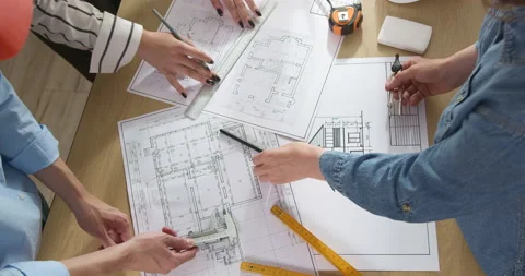 Colleagues architects are working on a construction project.  Stock Footage 210180865