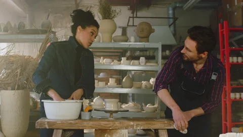 Colleagues Are Cleaning Up Tools In Pottery Studio Stock Footage 169936768