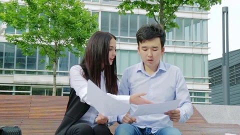 Colleagues arguing over a project Video stock 76649330