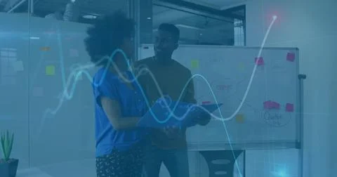 Colleagues with blue folder discussing and pointing at board with waveform in Stock Photos