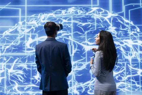 Colleagues building AI machine learning algorithms using virtual reality Stock Photos