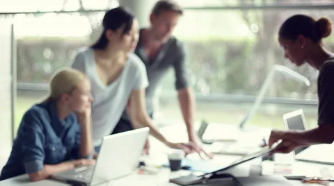 Colleagues collaborating on project Stock Footage 63289670