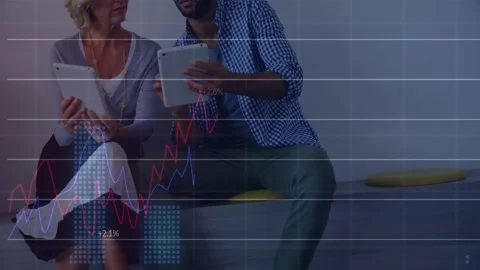 Colleagues comparing data, man raising tablet and gesturing, finance charts Stock Footage 329929578