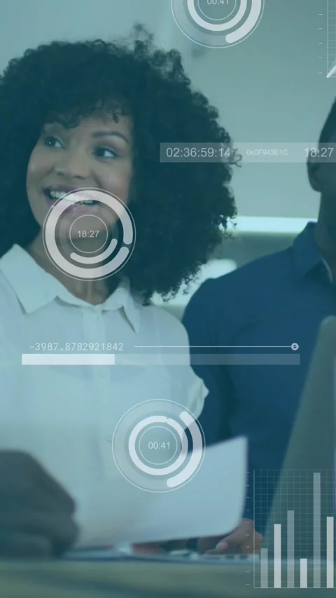 Colleagues discuss and process data joyfully in a meeting. Stock Footage 343615538