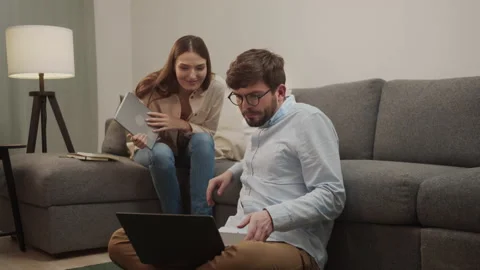 Colleagues discuss joint work and are satisfied with the result Stock Footage 154914115