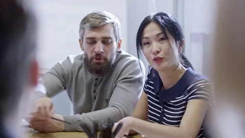 Colleagues Discussing Business Solution Stock Footage