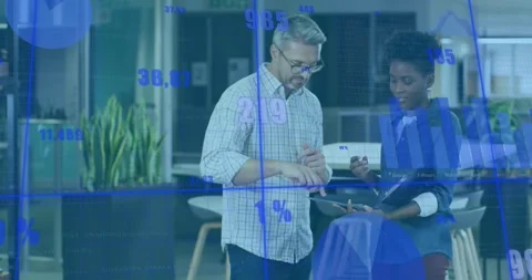 Colleagues discussing data metrics, stylus tapping causing charts to scroll for Stock Footage 317869775
