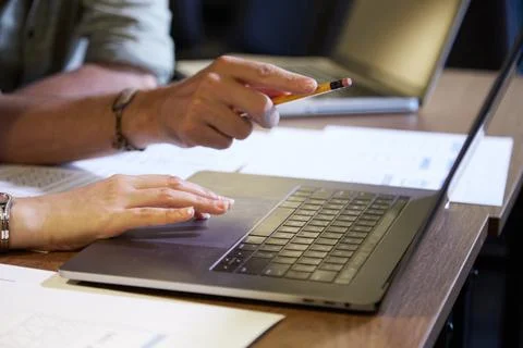 Colleagues discussing data on screen Stock Photos