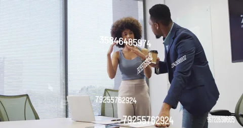 Colleagues discussing laptop spreadsheet data, initiating numeric overlays Stock Footage 314719346