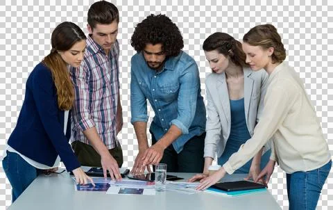 Colleagues discussing over tablet computer against white background Stock Photos