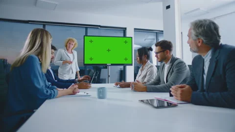 Colleagues discussing at presentation Video stock 164748558