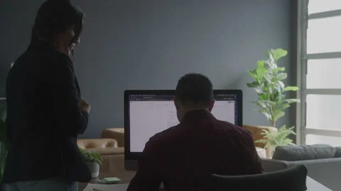 Colleagues Discussing a Project 스톡 동영상 208804393