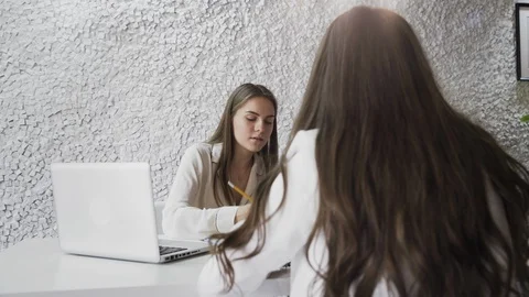 Colleagues discussing the project in the office. Stock Footage 115986591