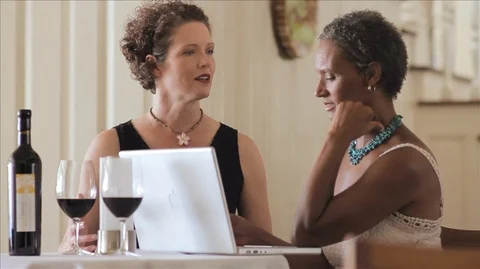 Colleagues discussing work at a restaurant. Stock Footage 88343206