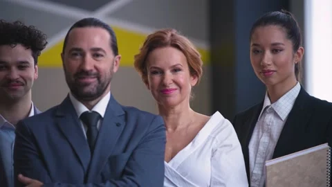 Colleagues, employees, workers in suits looking at camera, team, smiling Video stock 233717039