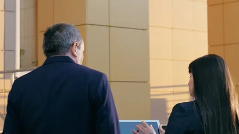 Colleagues engage in productive conversation considering different perspectives Stock Footage 254429384