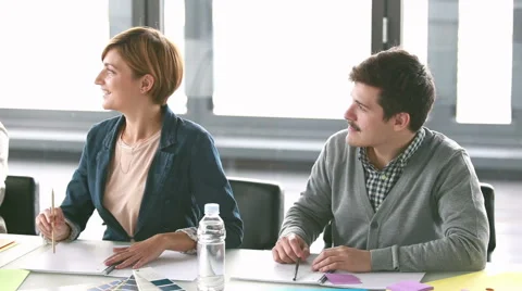 Colleagues giving high-five and applauding in conference room Stock Footage 59542043