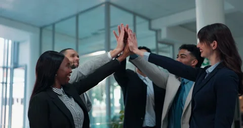 Colleagues, group and high five for celebration in office, lawyer and unity for Stock Footage 312868132
