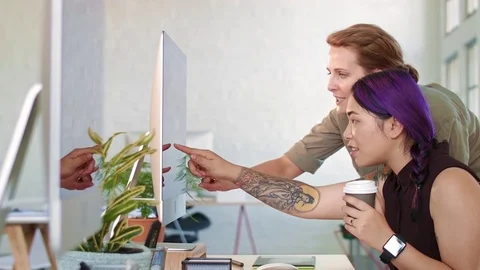 Colleagues interacting in the office Stock Footage 71632410