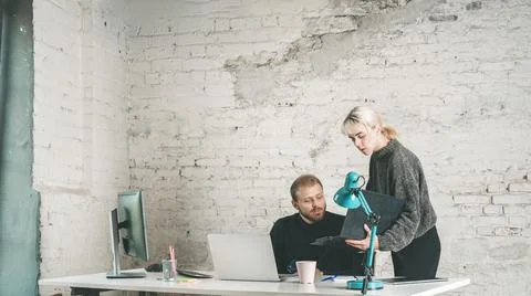 Colleagues Looking at Statistics in an Office Stock Photos