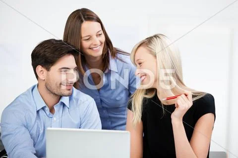 Colleagues at the office having a chat Stock Photos