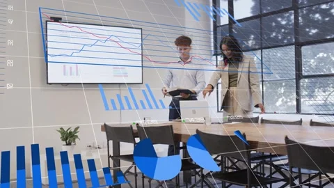 Colleagues placing laptop and papers, activating blue 3D charts and adjusting Stock Footage 334013661