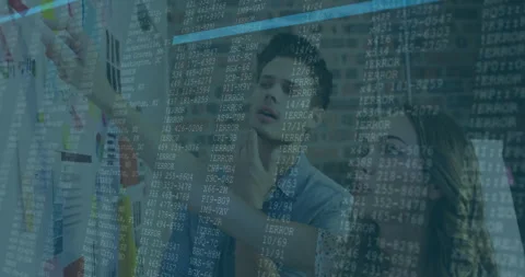 Colleagues pointing at chart and launching error overlay while inspecting data Stock Footage 313704289