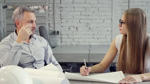 Colleagues sitting at office and working on architecture draw Video stock 110786301