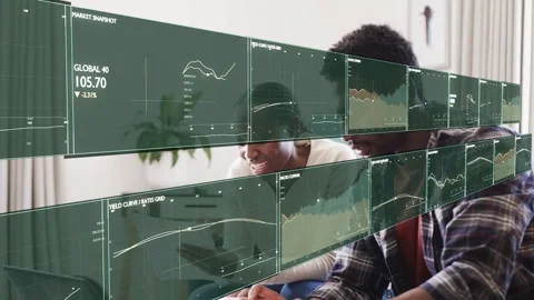 Colleagues sitting on sofa tapping devices and activating AR dashboards, Stock Footage 337905062