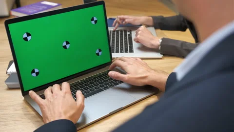 Colleagues in suits in the office work on laptops. Concept of business, startup Stock Footage 232096646