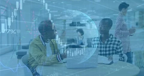 Colleagues at table discussing financial data, overlay animating stock charts Stock Footage 326765544