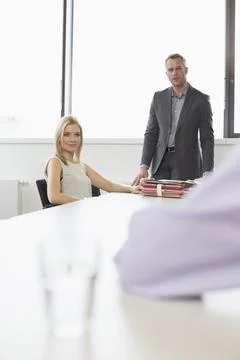 Colleagues taking interview of young man, smiling Stock Photos