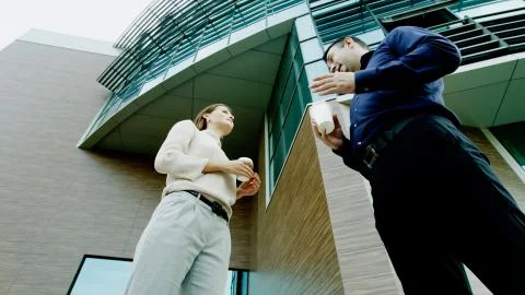Colleagues talk during a break Stock Photos