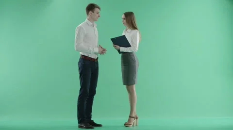 Colleagues talking on a green screen Stock Footage 63134974